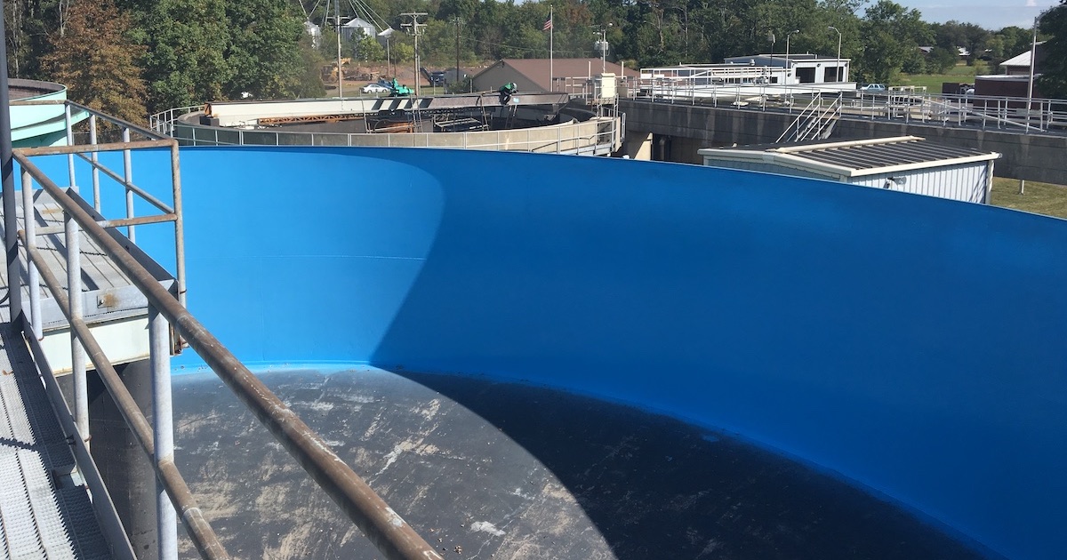 A wastewater lining applied to a concrete clarifier