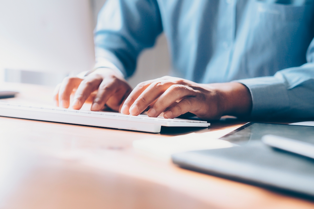 Man in front of laptop