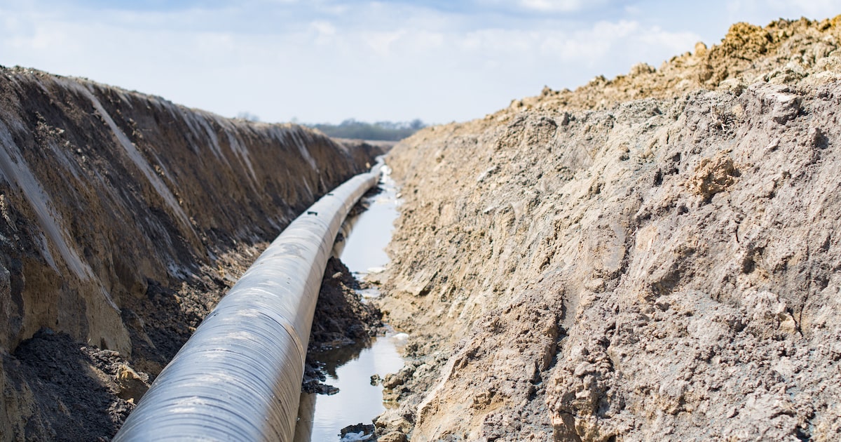 Pipe in ditch coated to prevent pipeline corrosion