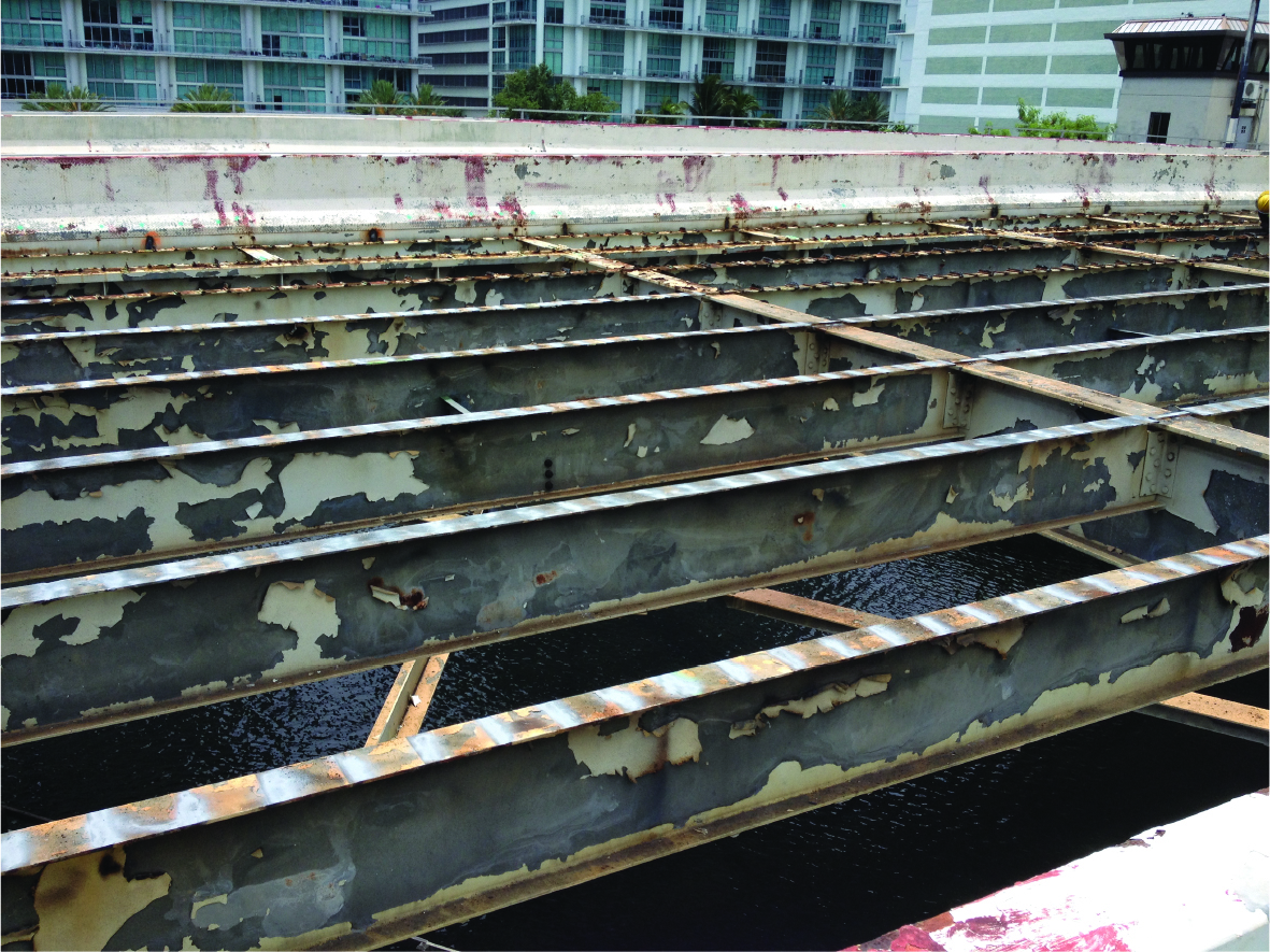 Fig. 1: The topside of the bridge span showing the existing coating failure