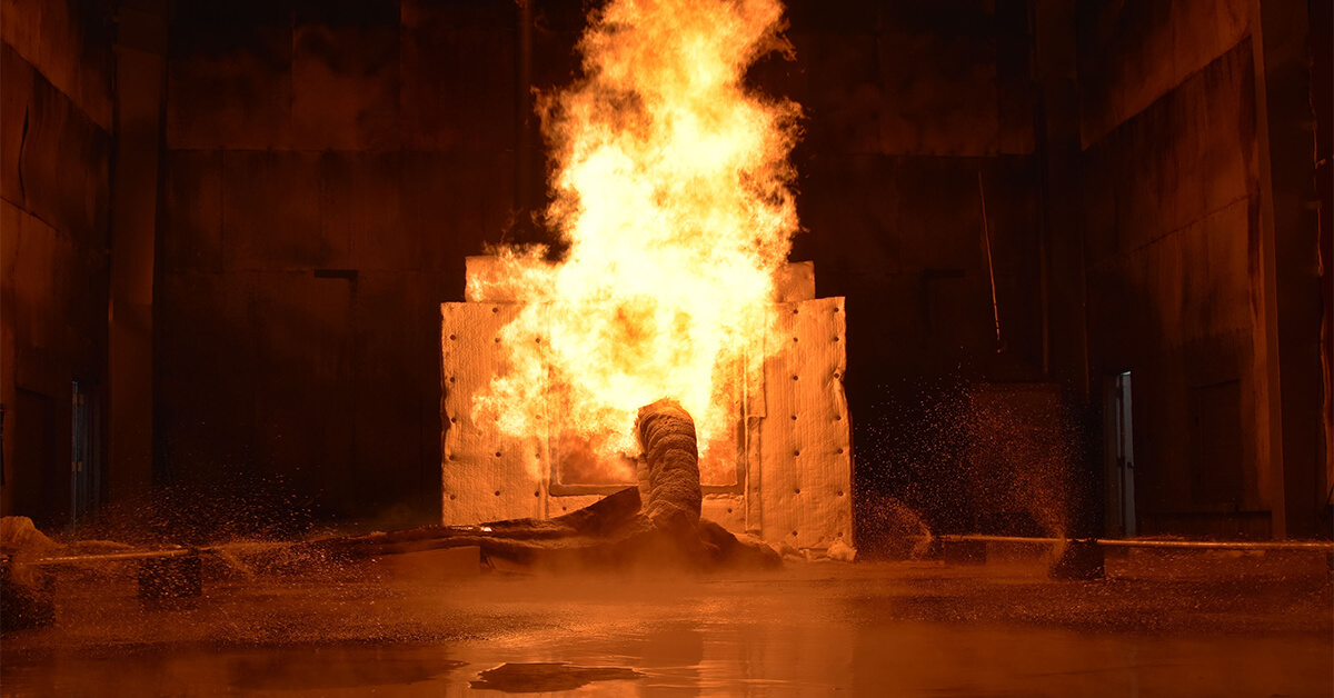 A test specimen is exposed to rigorous fire testing.