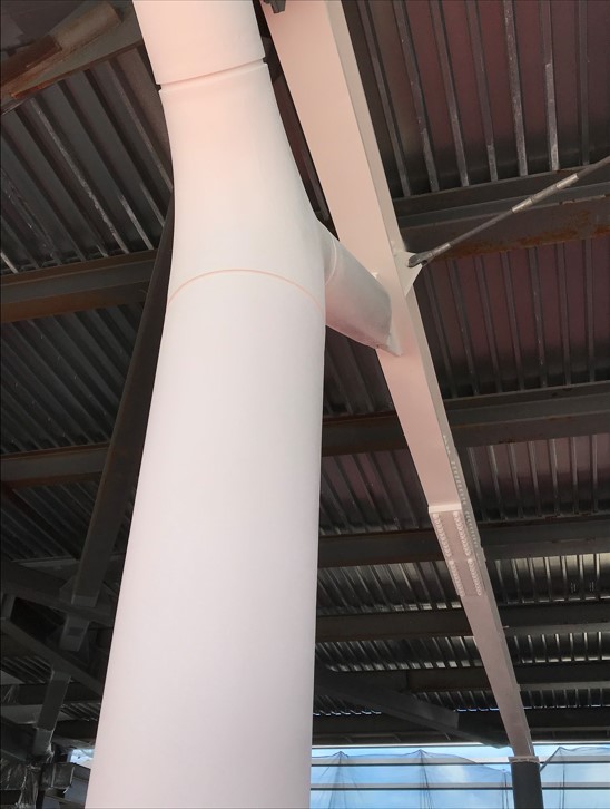 A steel column coated in Thermo-Sorb VOC, a single-component solvent-based intumescent coating.